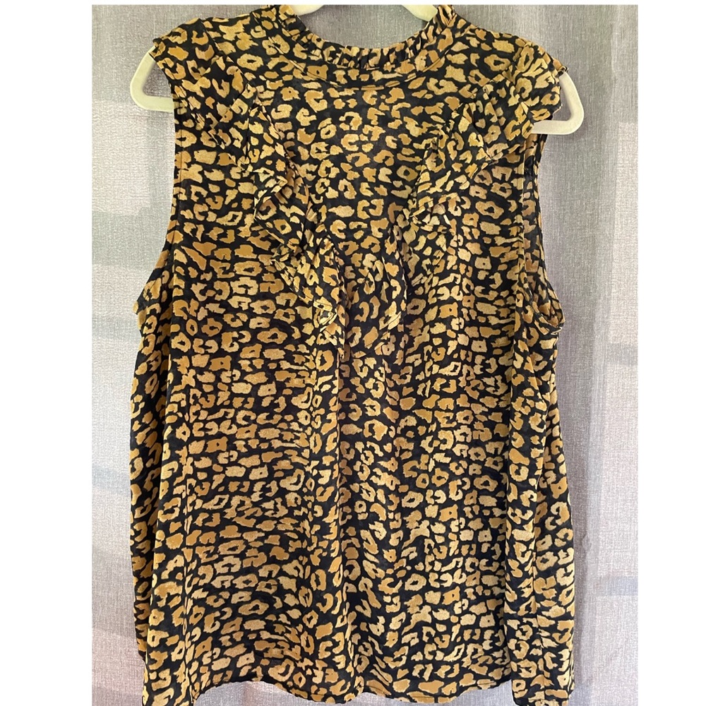 Leopard blouse.